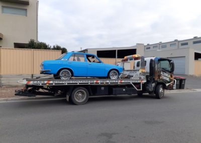 Towing a restored Datson 1600 in Adelaide, in the Adelaide eastern suburbs