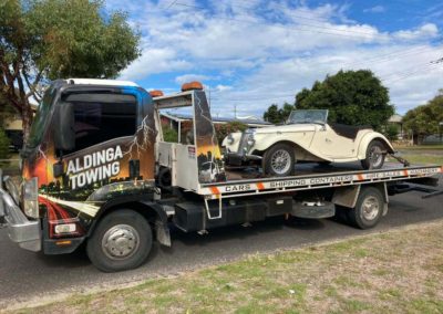 A 1955 MG sports car on its first leg from Goolwa to Edwardstown then onto WA.
